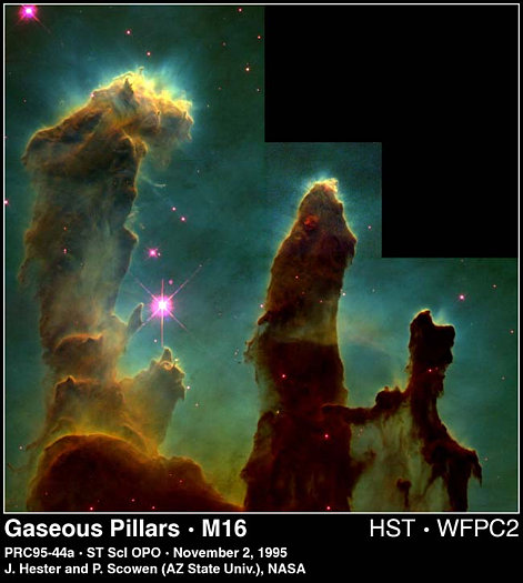 The Eagle Nebula, a region of space in which new stars are forming. Individual stars are surrounded by diffuse gas and dust.