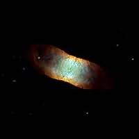 Nebula #2 has a greenish-white central region surrounded by orange and white gas. The overall shape is quite boxlike, in contrast to the oval shapes shown for Nebula #1.