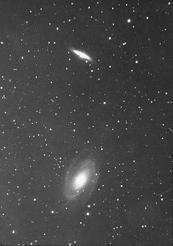 An optical image of two neighboring galaxies.
