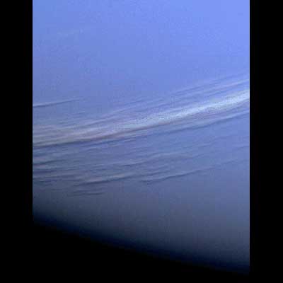 Thin streaky clouds in the atmosphere of Neptune are believed to be made up of methane ice.
