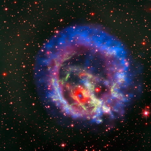X-ray and optical image of a supernova remnant, showing various colours of gas indicating various elements.