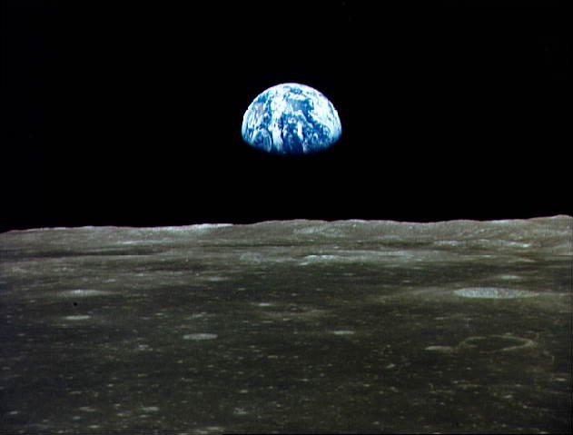 Image of an almost three-quarters illuminated Earth as seen from the surface of the Moon.