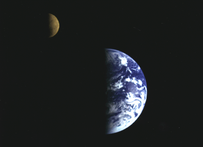 Image of the Earth and the Moon hanging in space, taken by the Galileo spacecraft.