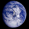 Planet Earth, with streaks and wisps of white clouds above a blue ocean.