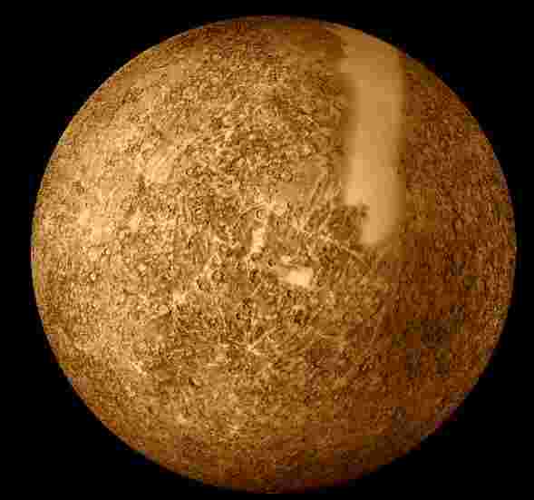 Planet Mercury, with a mottled brown surface.