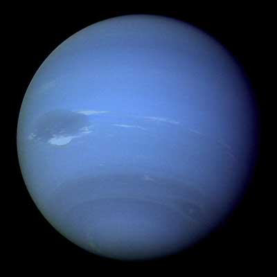 Neptune, with some horizontal clouds system and a large storm system named Scooter.