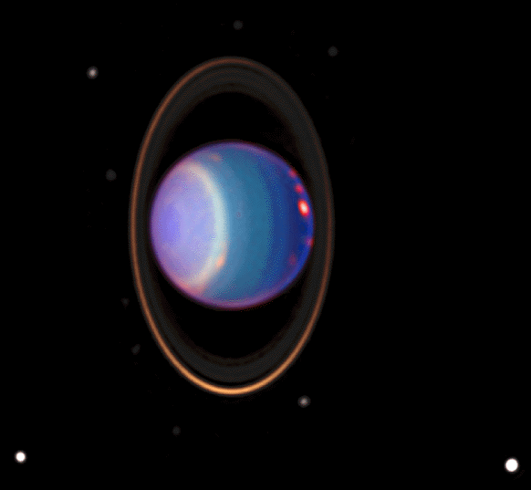 False-color image showing the horizontal banding of the Uranus atmosphere and the prominent ring system. The planet is shown tilted over on its side to emphasize the axial tilt (98 degrees).