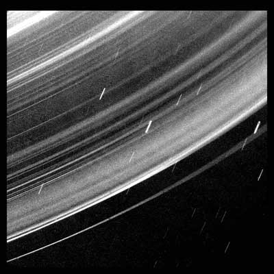 Close-up of extremely dark rings surrounding Uranus.