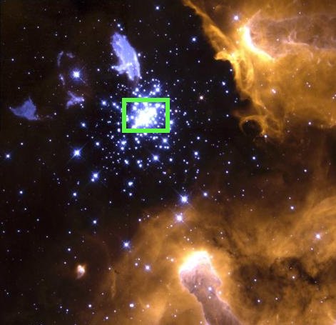 Hubble Space Telescope image shows a dense collection of bright, blue and white stars outlined in green, while to the right and below we observe diffuse orange and yellow diffuse clouds of gas.
