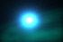 Bright star surrounded by gas within a galaxy