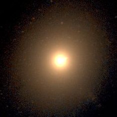 Telescope image of elliptical galaxy NGC 4486, focused on the central golden core.