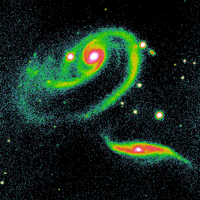 Telescope image of two interacting galaxies; the warps in the galaxy disks are clear signs of distortion.