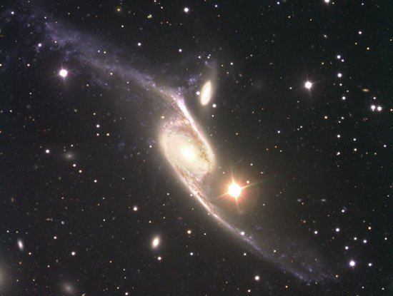 The greatly extended spiral arms of this galaxy are the result of interactions with a much lower mass dwarf galaxy.